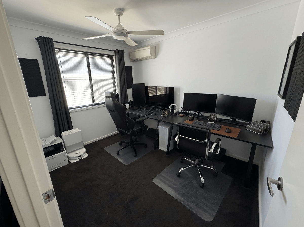 Office interior in Blacktec style — photo by GenRoom AI