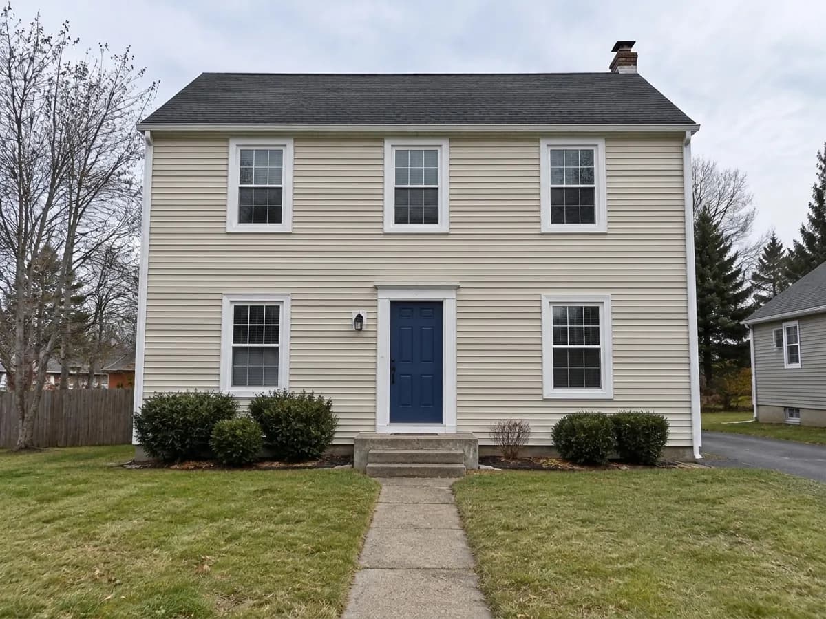 The same house — Navy blue door