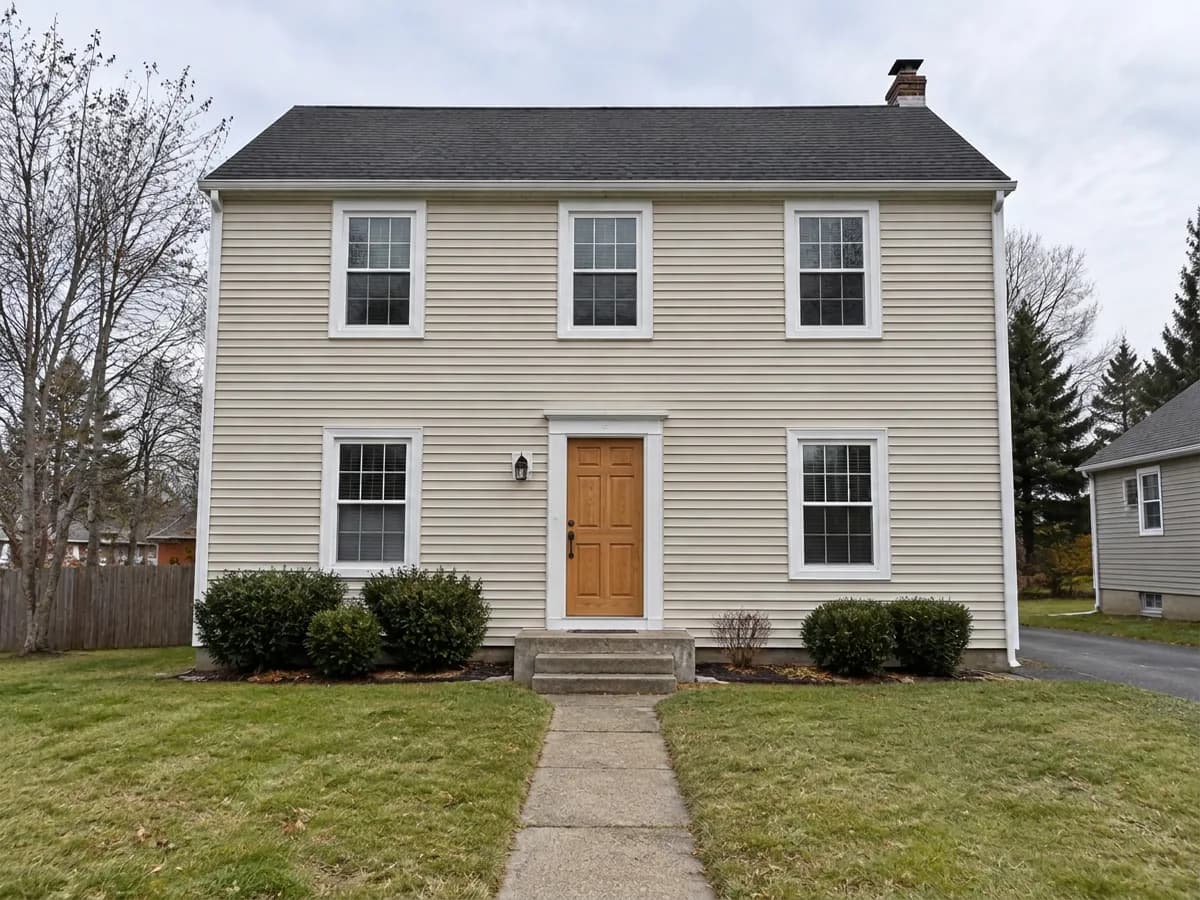 The same house — Natural wood door