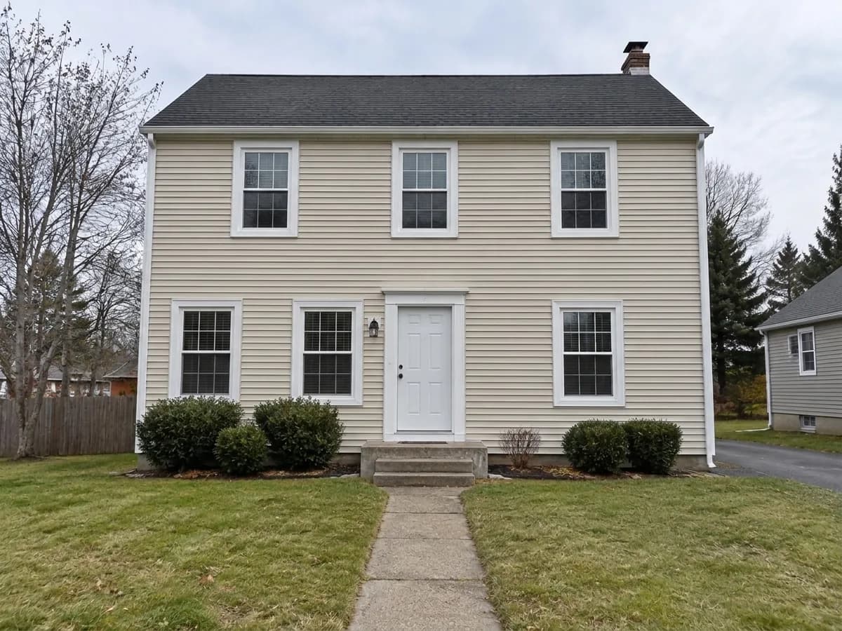 The same house with a new ground-floor window next to the front door