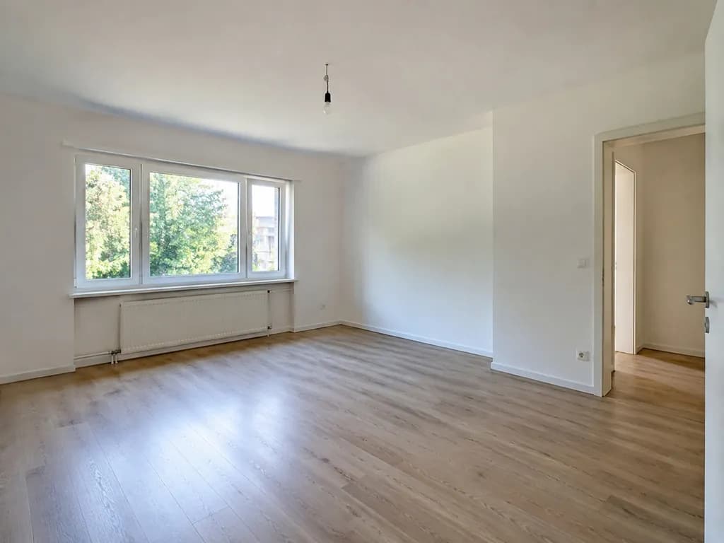 Before — Empty living room